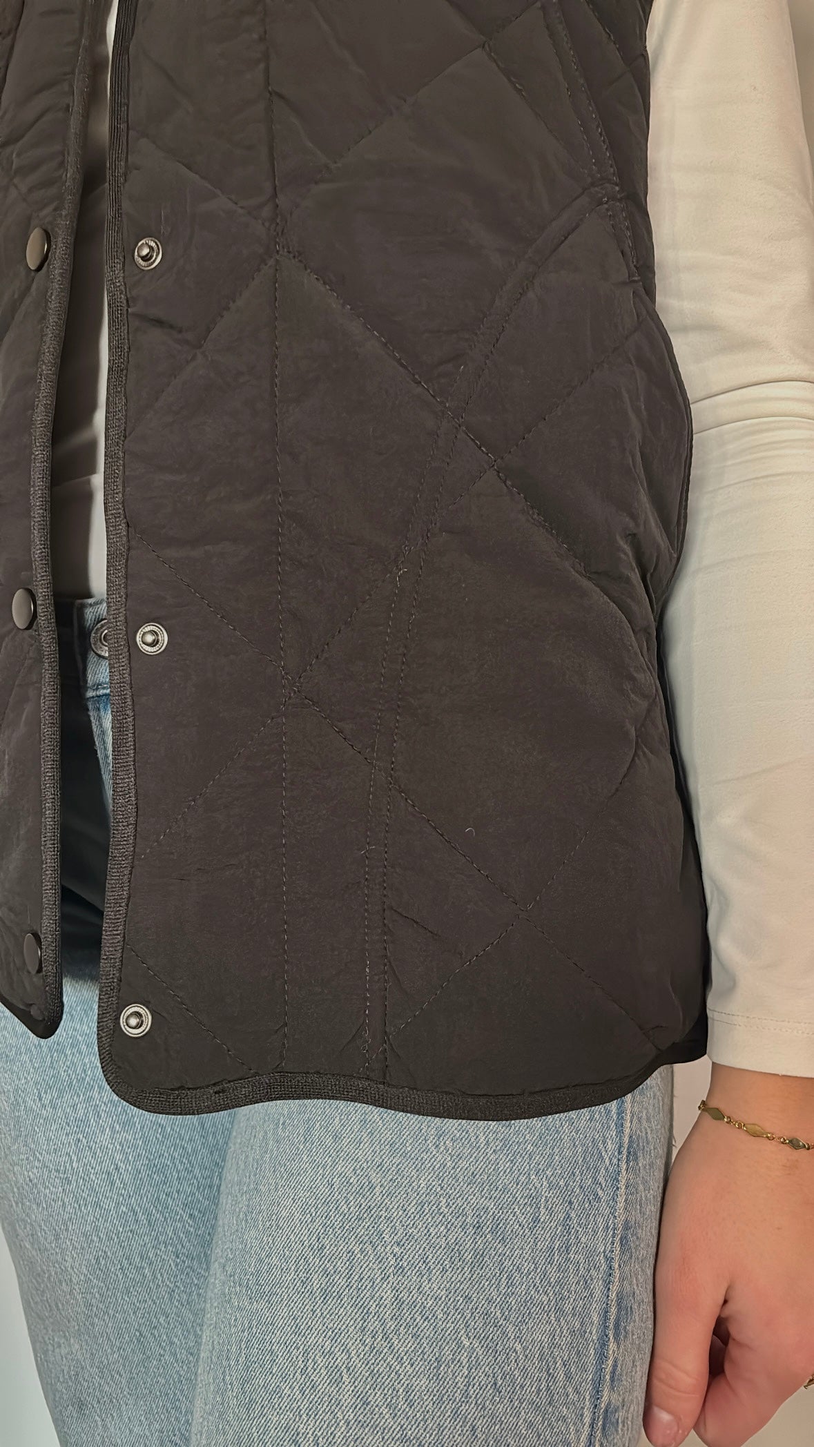 black quilted vest
