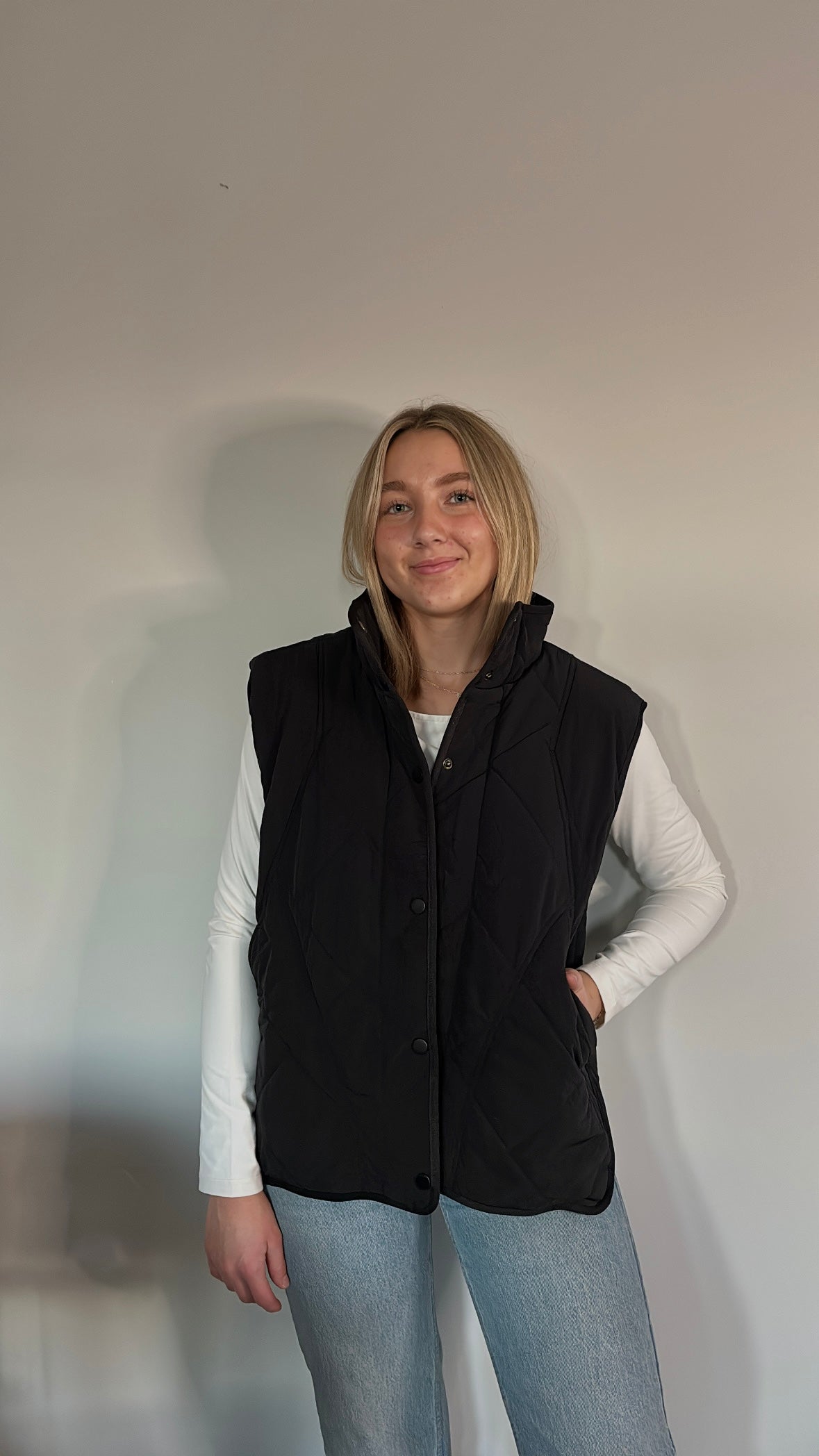 black quilted vest