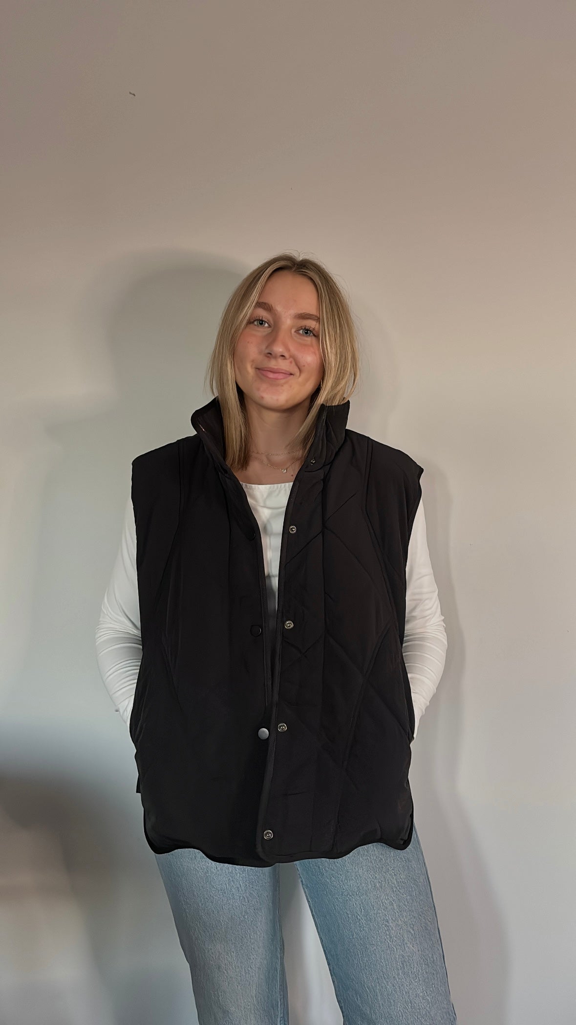 black quilted vest